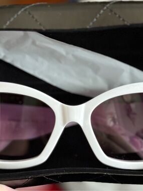 Women's White Frame Sunglasses with matching leather case to protect them